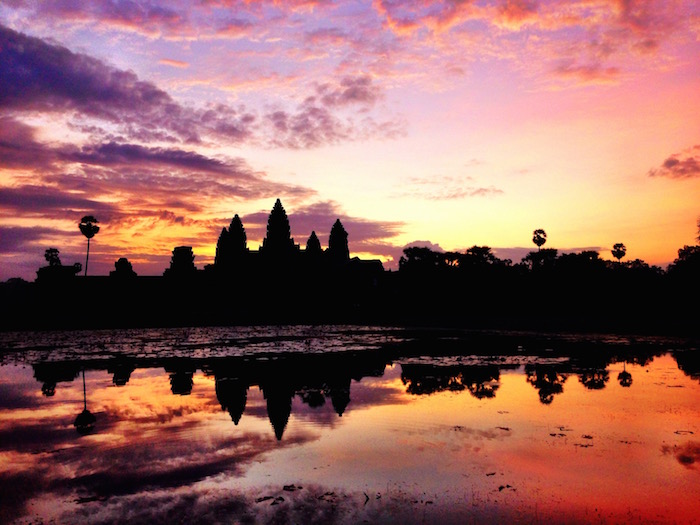 Visiting Angkor Wat Temple sunrise Cambodia Siem Reap aroundtheworldwithjustin.com