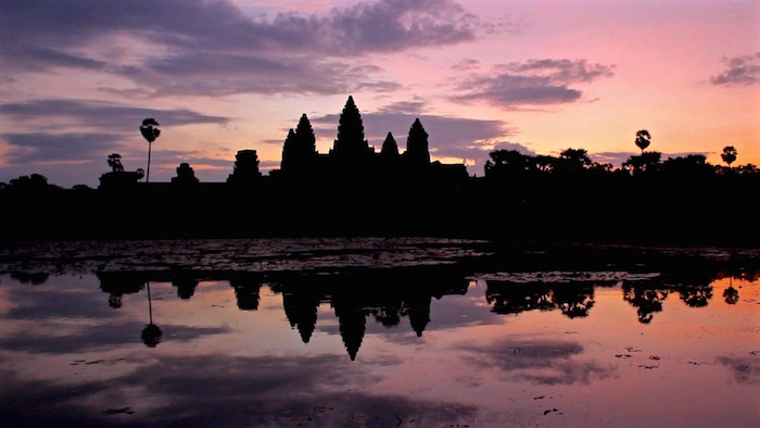 Visiting Angkor Wat Temple sunrise Cambodia Siem Reap aroundtheworldwithjustin.com